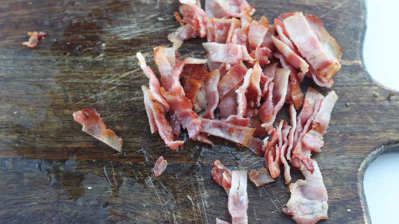 chopped bacon on cutting board