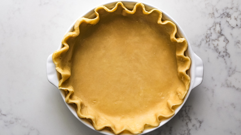 pie dough in pie dish