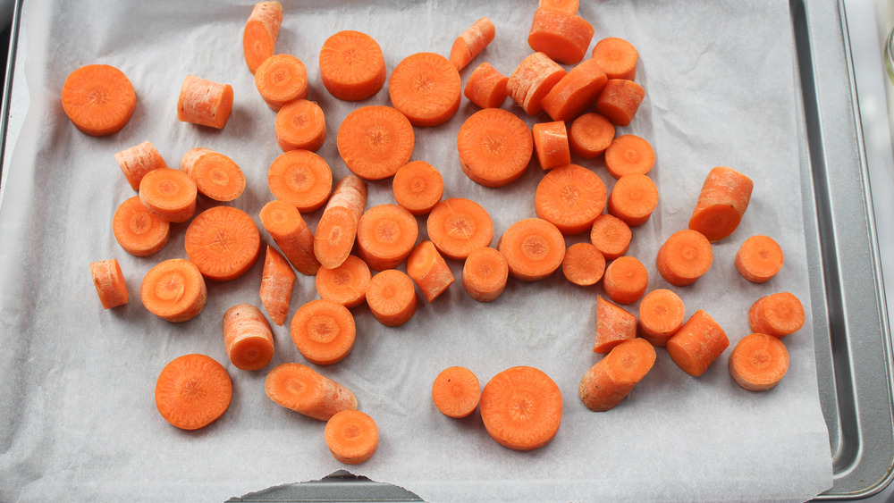 sliced carrots on sheet pan for roasted carrot soup