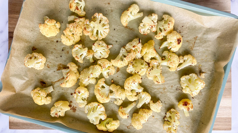 Baked cauliflower on a lined sheetpan