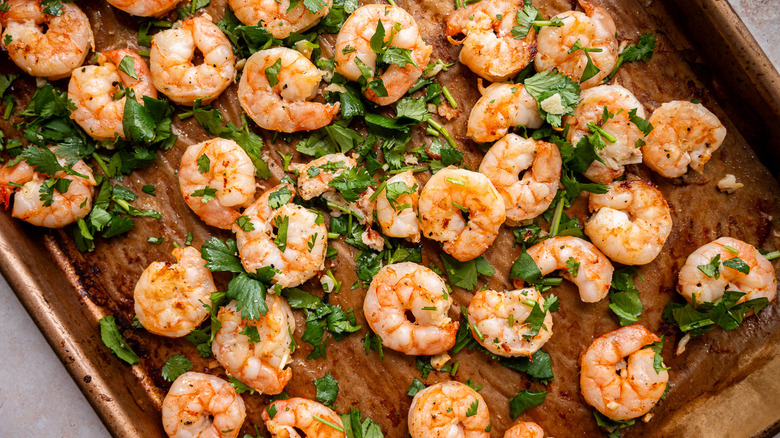 cilantro topped on baked shrimp