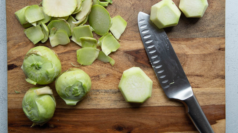 kohlrabi and knife on cutting board