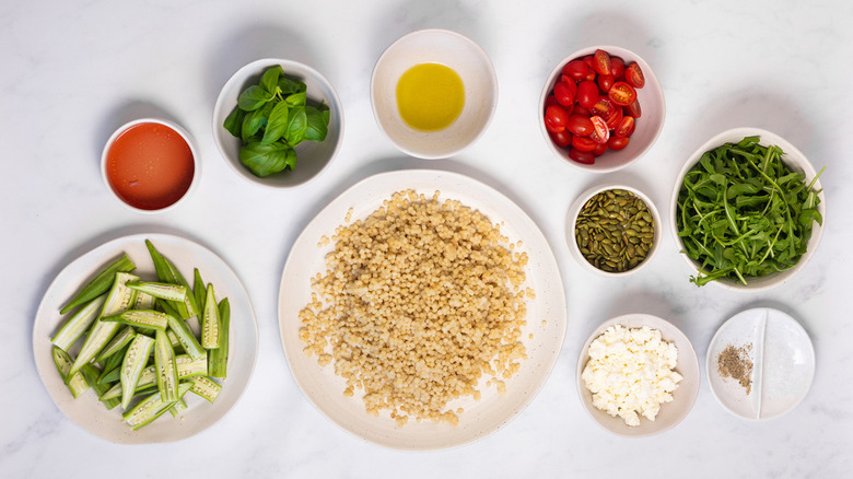 okra tomatoes couscous and arugula