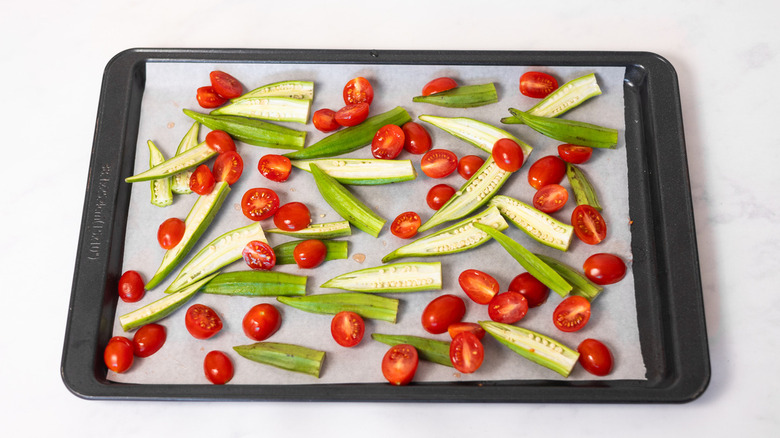 okra and tomatoes in pan