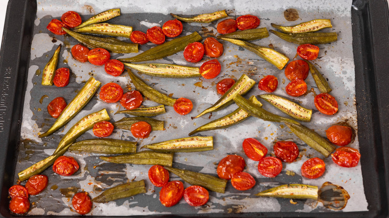 okra and tomatoes in pan