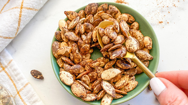 roasted pumpkin seeds in bowl 