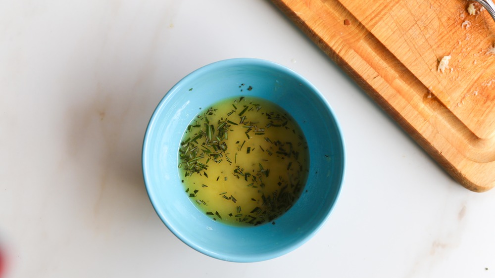 melted butter with garlic and rosemary for roasted fingerling potatoes