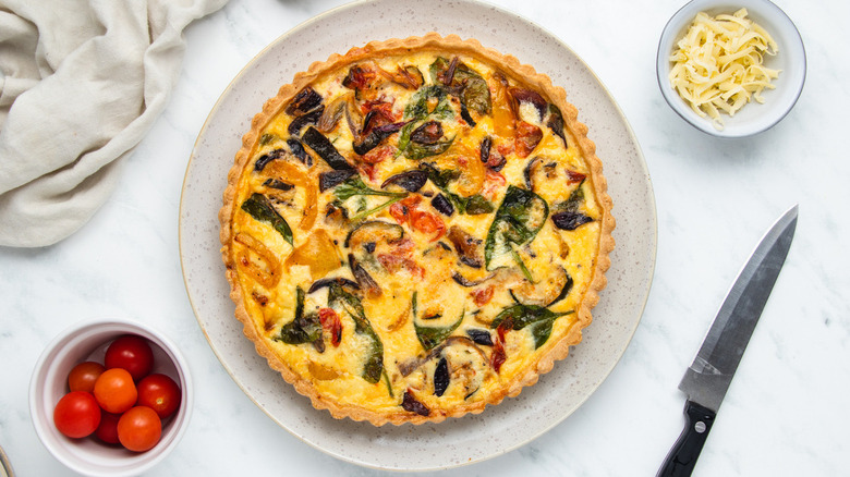 roasted vegetable quiche on plate