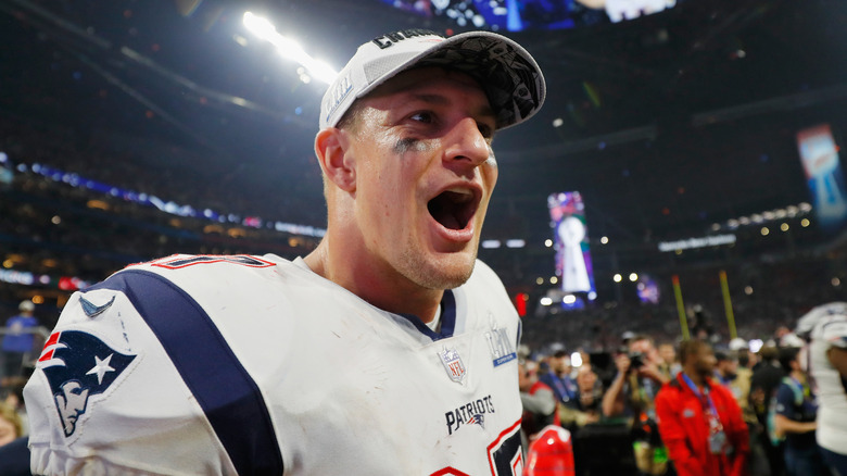 Rob Gronkowski mouth open in football jersey