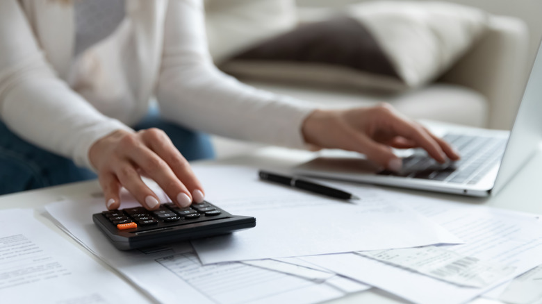 woman calculating data