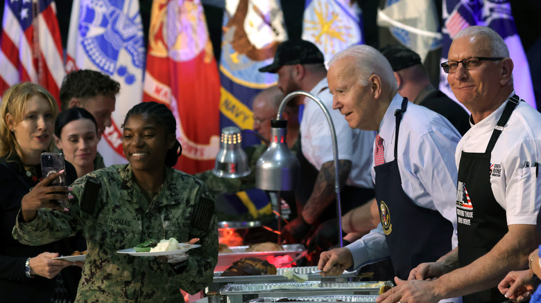 Soldier with President Biden and Robert Irvine