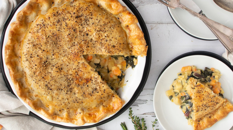 root vegetable pie with slice on plate