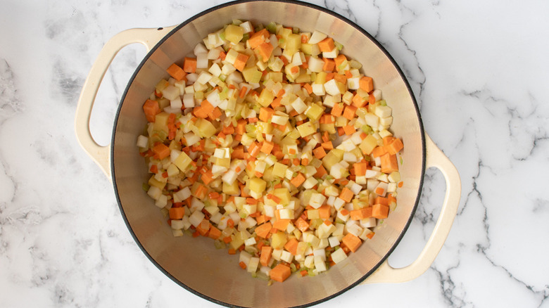 diced root vegetables in pot