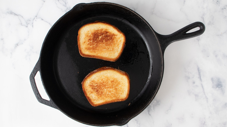 toasted bread slices in skillet