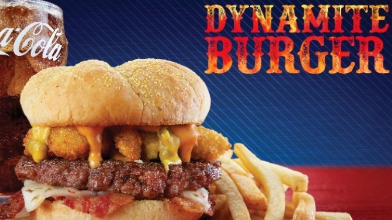 Roy Rogers Dynamite Burger alongside fries and soda