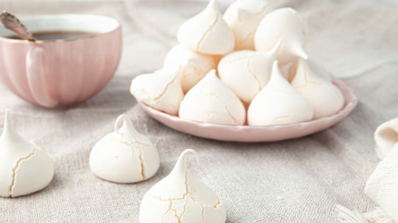 meringue cookies on pink plate