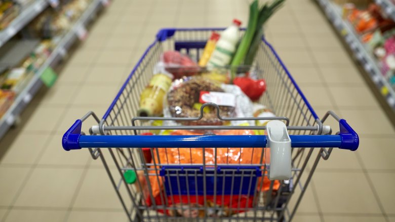 pushing a grocery cart