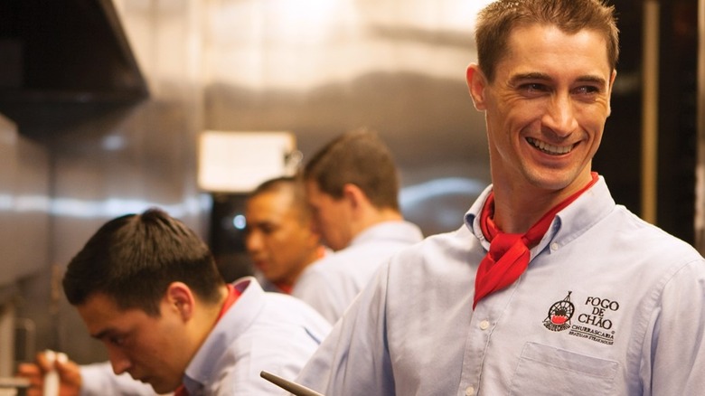 Fogo employee smiling in kitchen 