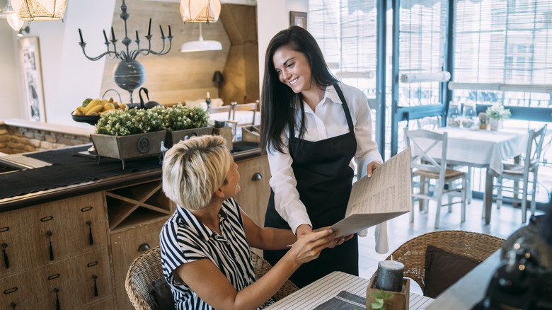 server taking a customer's order