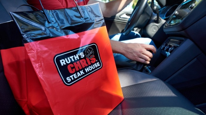 Ruth's Chris to-go bag in car