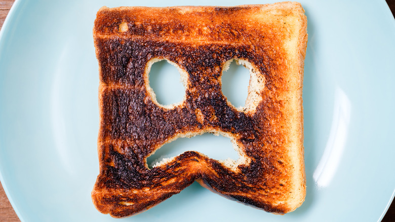 burnt toast with sad face