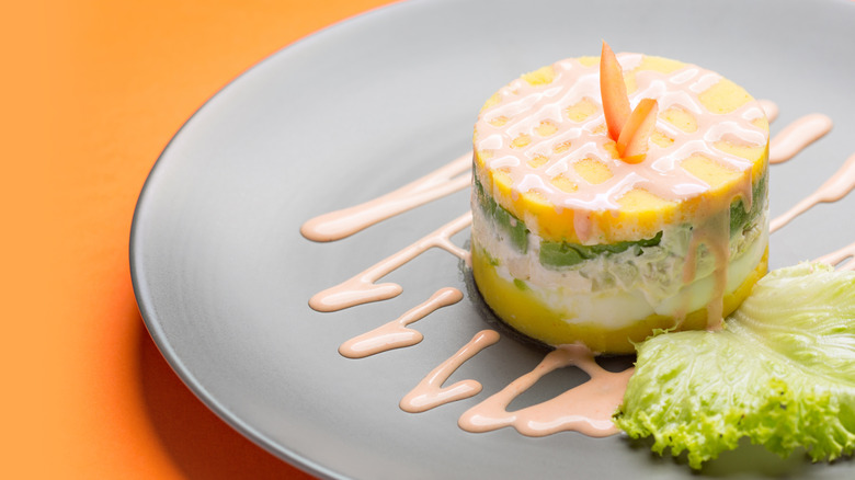 Causa rellena with salsa golf