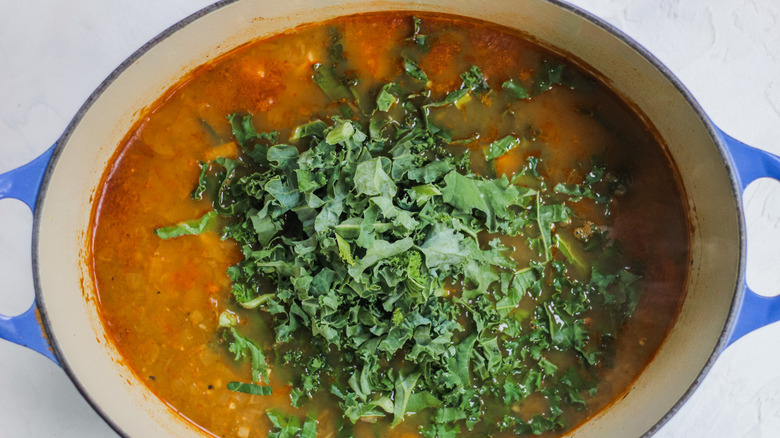 soup in pot with kale