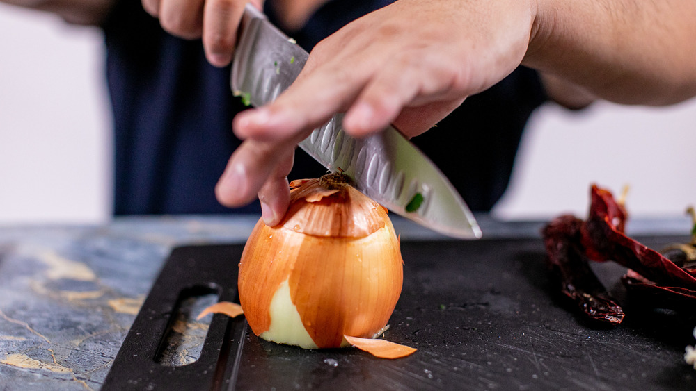 chopping onion for salsa