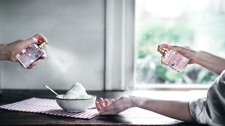 People spraying salt & straw perfume on ice cream and themselves