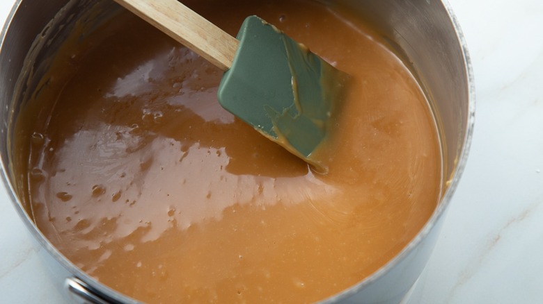 melted caramel in saucepan