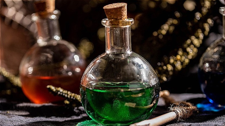 green drink in potion bottle