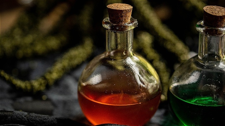 red drink in potion bottle