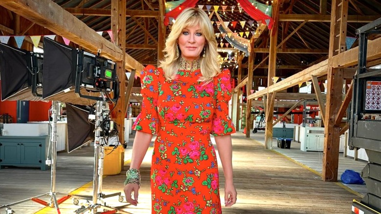 Sandra Lee in orange floral dress