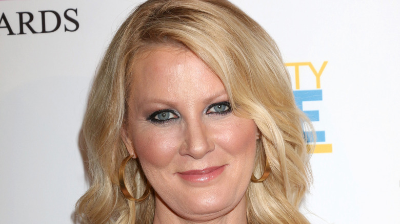 Sandra Lee smiling lips closed