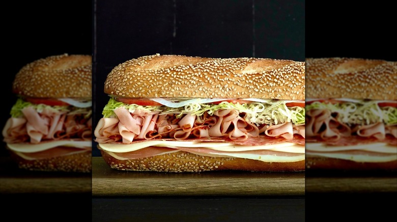 Stacked deli sandwich with ham and turkey