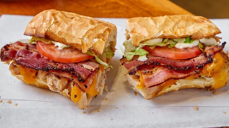 Sliced BLT grinder with pepper-crusted bacon