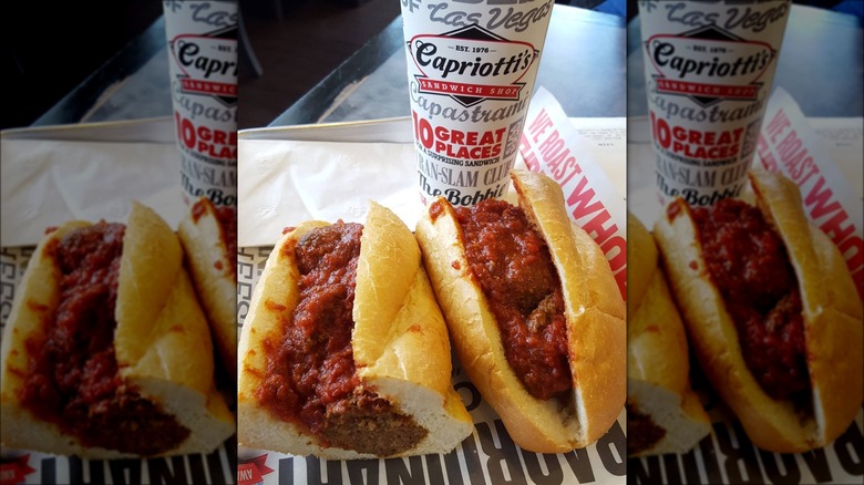 Sliced meatball sandwich on tray