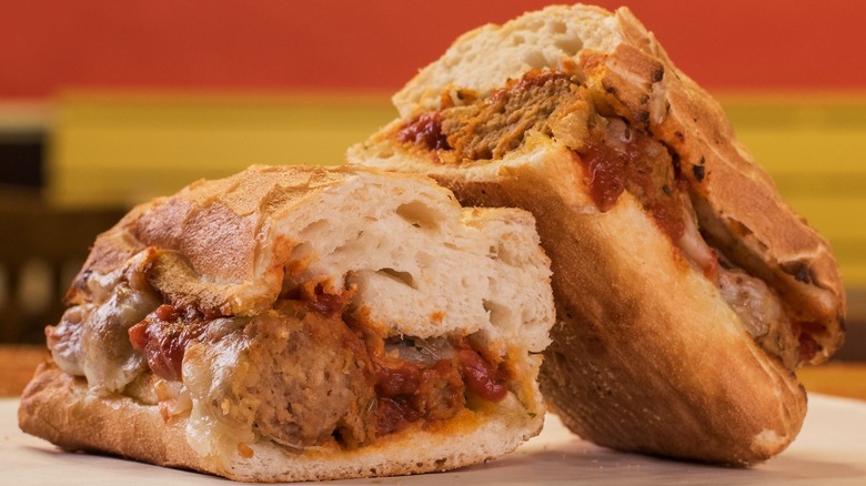 Meatball sandwich sliced in half