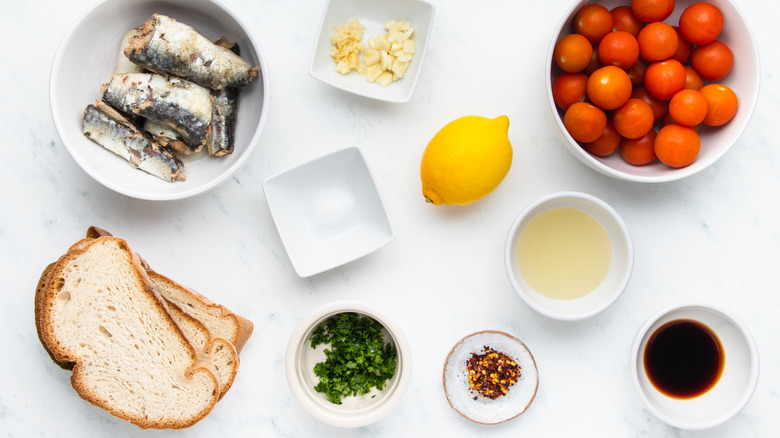 Sardine and tomato toast ingredients laid out