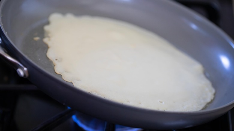 crepe batter in pan