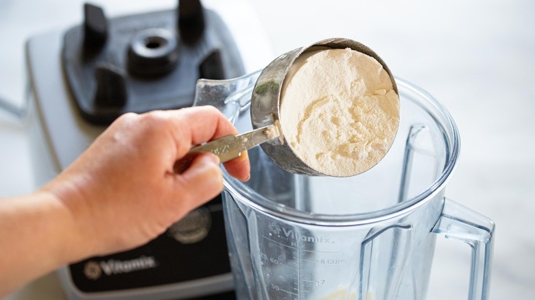 adding flour to blender 