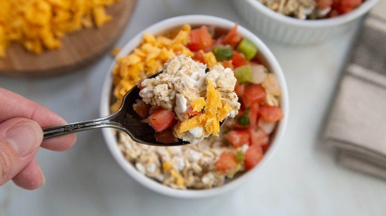 savory Southwest cheddar overnight oats with spoon