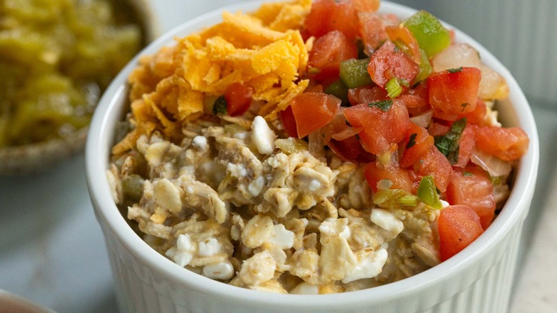 overnight oats topped with cheese and pico de gallo