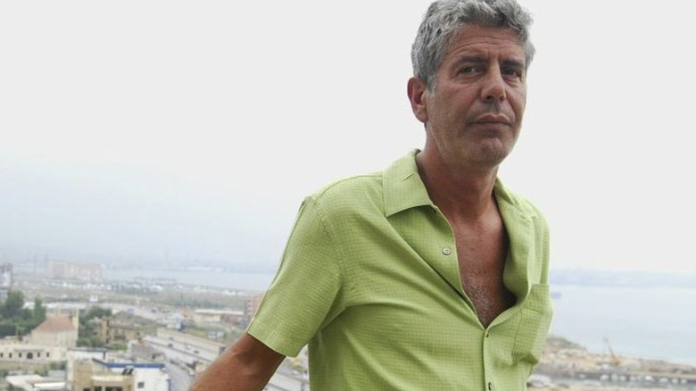 Anthony Bourdain poses outdoors in Beirut, Lebanon