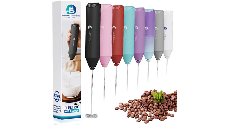 Handheld milk frothing wands in assorted colors.