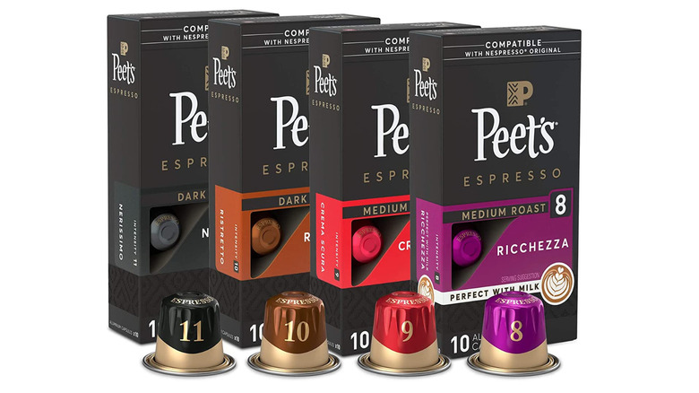 Four black boxes of Peet's coffee pods. 