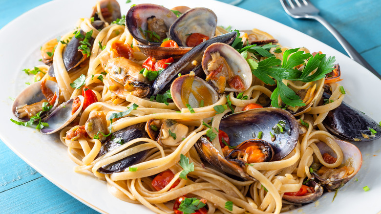 Seafood pasta with fresh cilantro