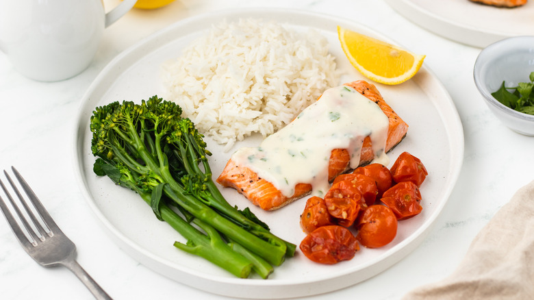 seared trout with creamy sauce, rice, and veg