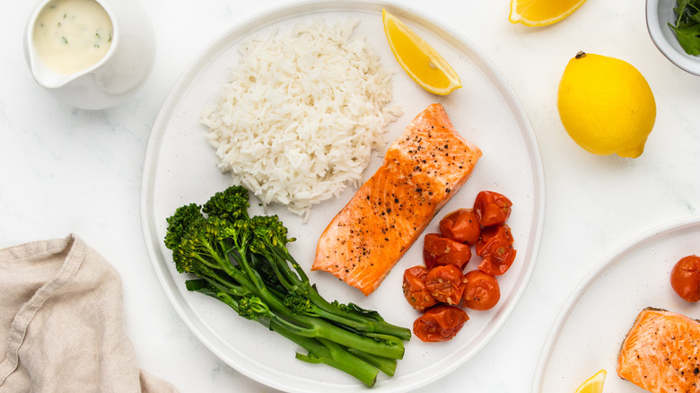 seared trout, rice, and veg on plate