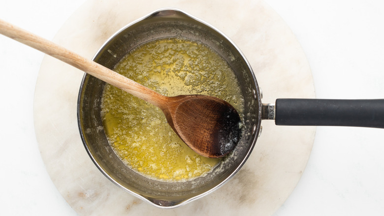 melted butter and garlic in saucepan